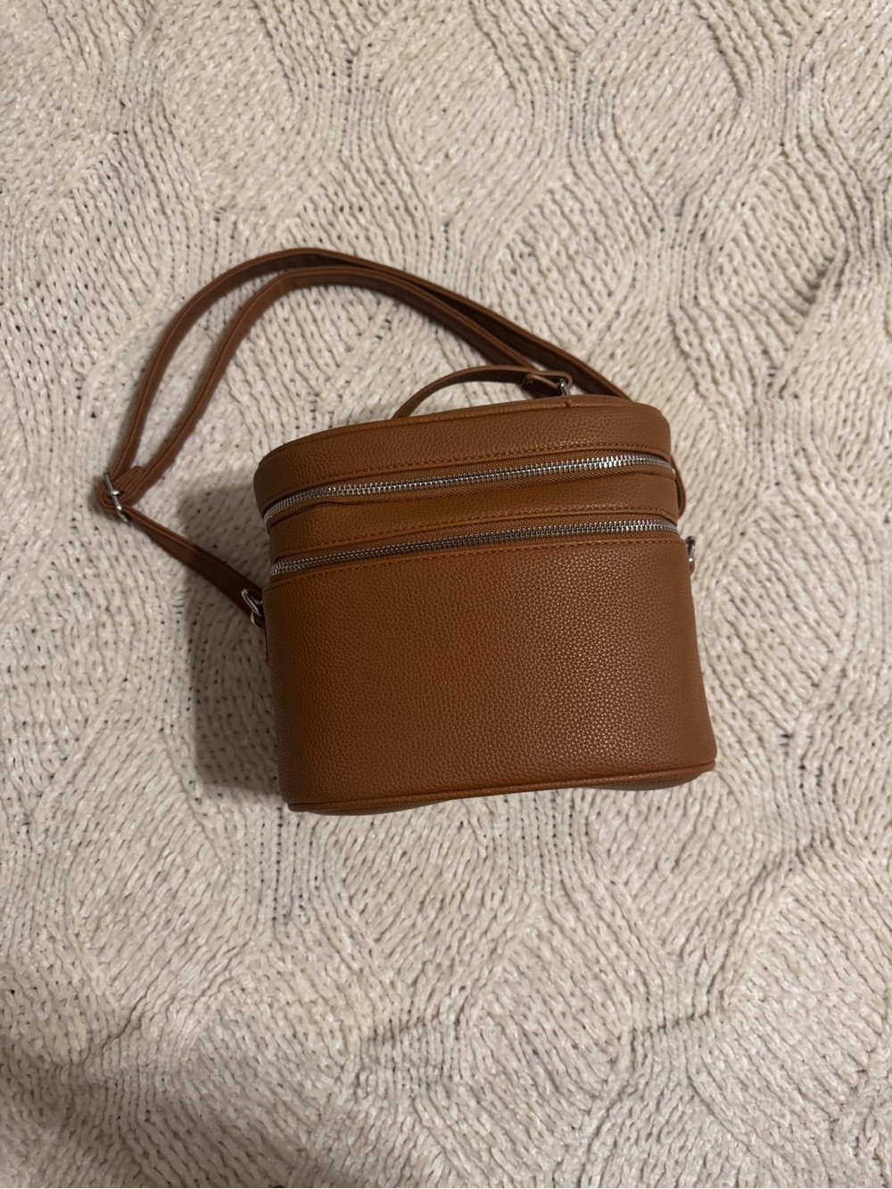 Tan crossbody makeup bag